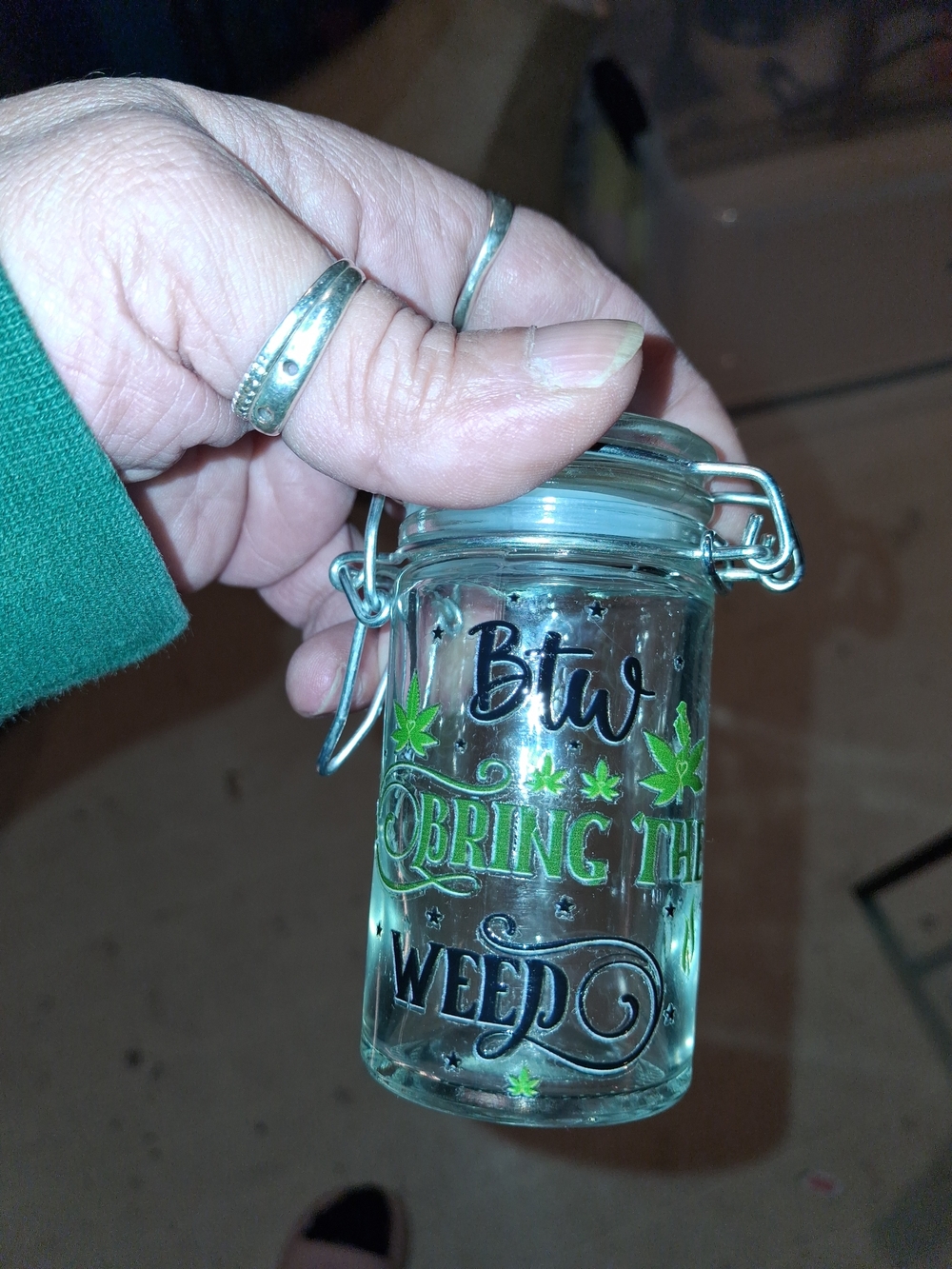Clear Glass Clip-Top Jar with Green Accent Cannabis Design